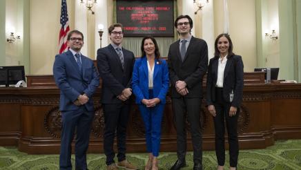 Assemblymember Petrie-Norris and staff on the Assembly Floor