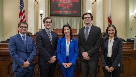 Assemblymember Petrie-Norris and staff on the Assembly Floor