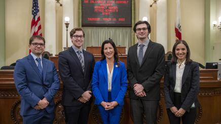 Assemblymember Petrie-Norris and staff on the Assembly Floor