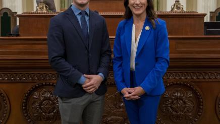 Assemblymember Petrie-Norris and staff on the Assembly Floor