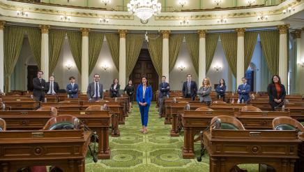 Assemblymember Petrie-Norris and staff on the Assembly Floor